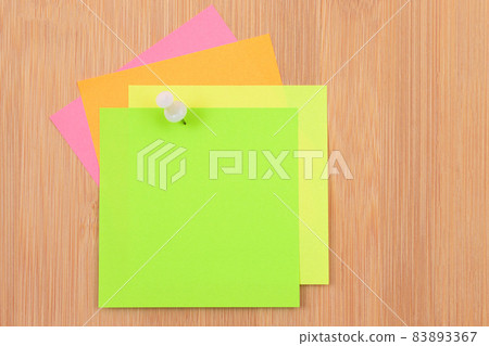 Colored Sticky Notes Pinned to the Wooden Message Board Colored Sticky Notes Pinned to the Wooden Message Board 83893367