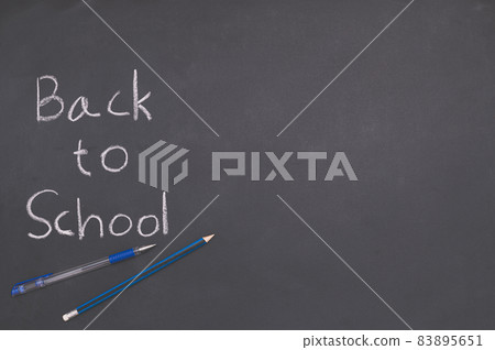 Back to school and education concept Pen and pencil are placed on the blackboard. Back to school and education concept Pen and pencil are placed on the blackboard. 83895651