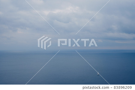 Ship floating on sea. Fishermans in boat. 83896209