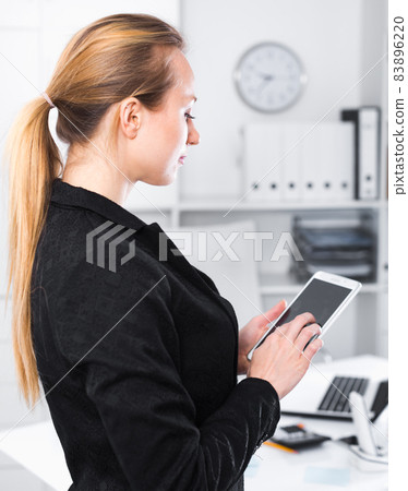 Woman working and touching screen 83896220