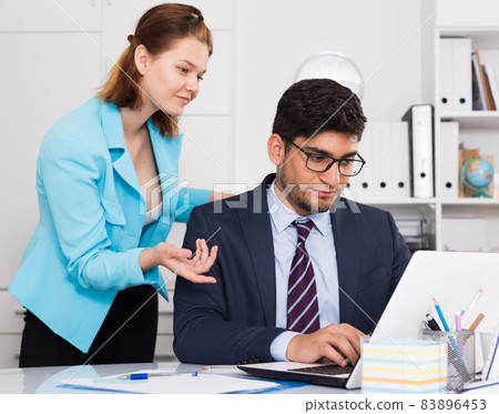 Business partners working in office Business partners working in office 83896453