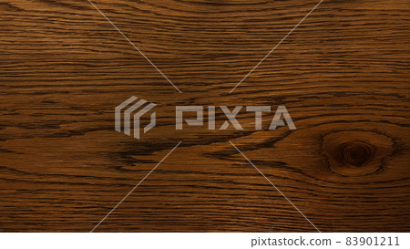 Background image of brown board with striped wood grain and one knot Background image of brown board with striped wood grain and one knot 83901211