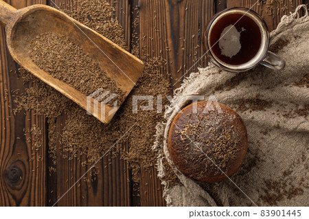 Traditional kvass beer mug with rye bread  on rustic style wooden table. 83901445
