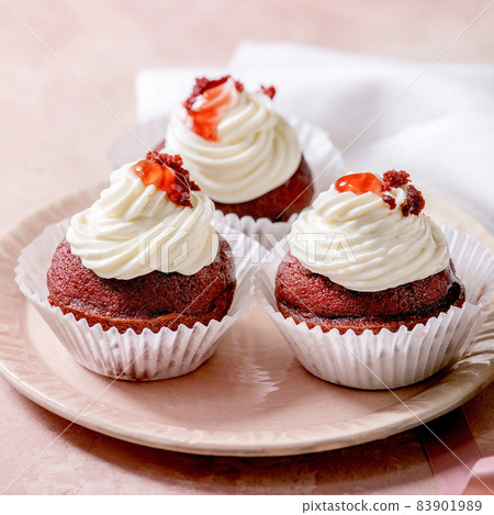 Homemade Red velvet cupcakes with whipped cream 83901989