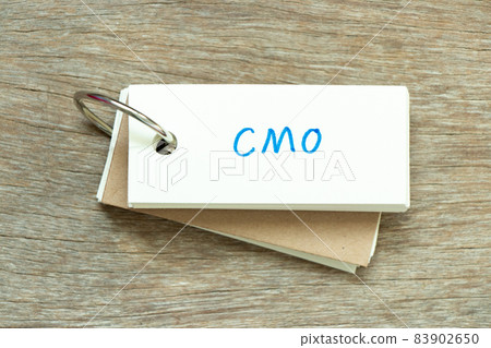 Flash card with handwriting word CMO (Abbreviation of Chief Marketing Officer, Contract Manufacturing Organization) on wood background Flash card with handwriting word CMO (Abbreviation of Chief Marketing Officer, Contract Manufacturing Organization) on wood background 83902650