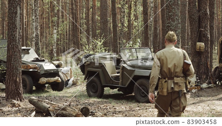 Set. Russian Soviet World War II Four-wheel Drive Army Truck Gaz-67 Car And Peasant Carts In Forest. WWII Equipment Of Red Army Set. Russian Soviet World War II Four-wheel Drive Army Truck Gaz-67 Car And Peasant Carts In Forest. WWII Equipment Of Red Army 83903458