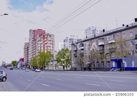 "Chelyabinsk, Chelyabinsk region / Russia-04. 05. 2020: Vorovsky street, city center, near the TV center and medical Academy, road, street and houses". "Chelyabinsk, Chelyabinsk region / Russia-04. 05. 2020: Vorovsky street, city center, near the TV center and medical Academy, road, street and houses". 83906105