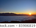 The rising sun over the sea of clouds 83906819