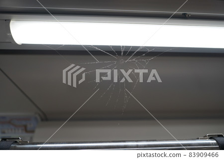 Spider web on the straps of the train Spider web on the straps of the train 83909466