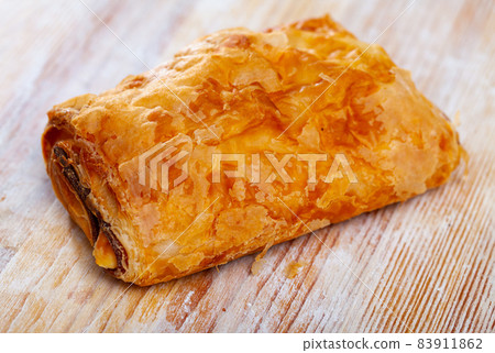 Napolitana with meat and cheese, spanish pastry Napolitana with meat and cheese, spanish pastry 83911862