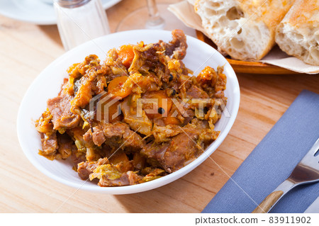 Stew of cabbage with pork Stew of cabbage with pork 83911902