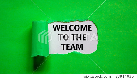 Welcome to the team symbol. Words 'Welcome to the team' appearing behind torn green paper. Beautiful green background. Business, welcome to the team concept, copy space. 83914030