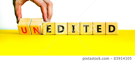 Edited or unedited symbol. Businessman turns wooden cubes and changes the word unedited to edited. Business and edited or unedited concept. Beautiful white background, copy space. Edited or unedited symbol. Businessman turns wooden cubes and changes the word unedited to edited. Business and edited or unedited concept. Beautiful white background, copy space. 83914105