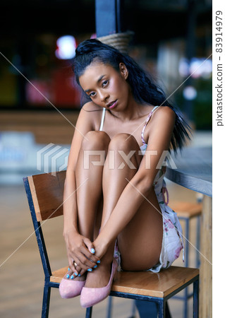 Young beautiful asian woman posing in the supermarket Young beautiful asian woman posing in the supermarket 83914979