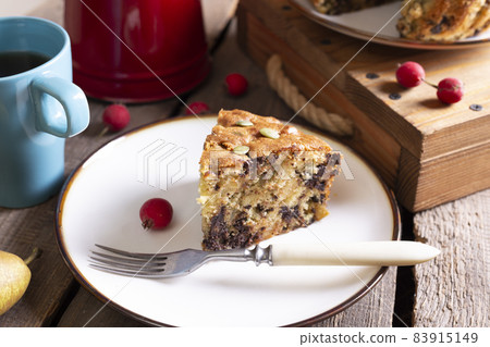 pear pie with chocolate and a cup of tea 83915149