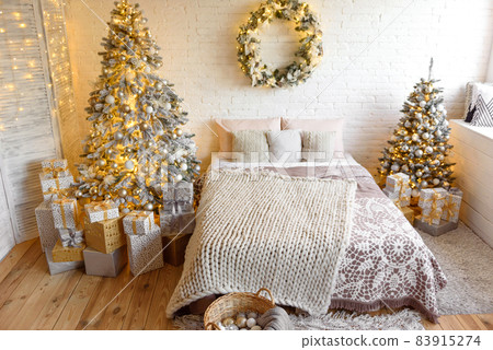 Christmas and New Year decorated interior room with presents and New year tree Christmas and New Year decorated interior room with presents and New year tree 83915274