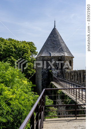 The Ancient Fortress of Carcassonne, France. Europe castle. View from the Cite. The Ancient Fortress of Carcassonne, France. Europe castle. View from the Cite. 83915903