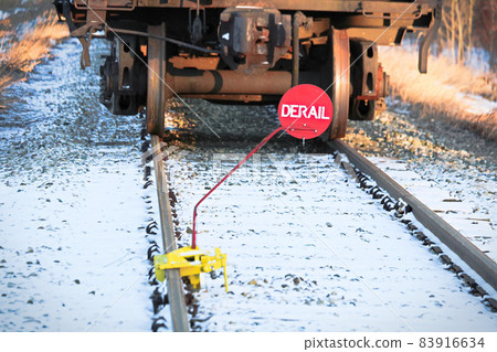 Closeup of a derail sign on a track rail Closeup of a derail sign on a track rail 83916634