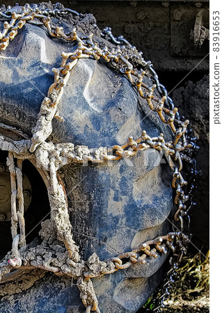 Chains used on a heavy equipment tire for grip Chains used on a heavy equipment tire for grip 83916653