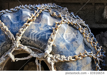 Chains used on a heavy equipment tire for grip Chains used on a heavy equipment tire for grip 83916654