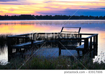 A bird viewing platform at sunrise over Jessie Lake A bird viewing platform at sunrise over Jessie Lake 83917806