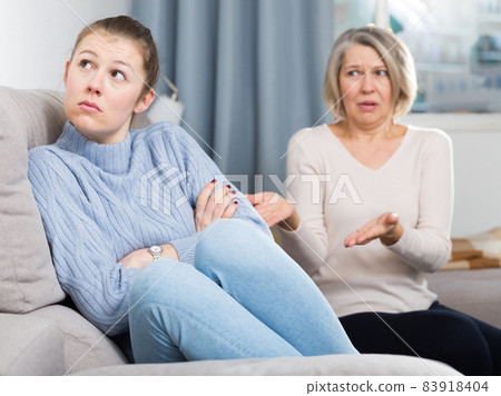 Family quarrel of an mother and adult daughter 83918404
