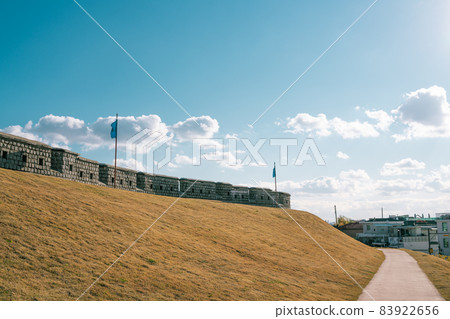 Hwaseong fortress road at autumn in Suwon, Korea 83922656