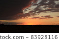 Look at the horizon at sunset 83928116