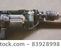 Disassembled tool electric drill. Instrument to work. 83928998