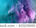 Abstract pink and blue and green color background. Swirling vibrant hookah smoke, dynamic paint in water. 83929000