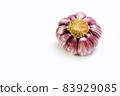 Head of garlic on white background. isolate 83929085