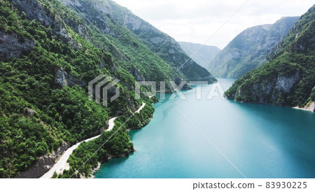 Aerial view of Pivsko lake. Beautiful blue water in Piva river, Montenegro 83930225