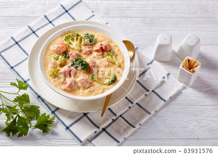 Broccoli Cheddar cheese Sausage Soup in a bowl Broccoli Cheddar cheese Sausage Soup in a bowl 83931576