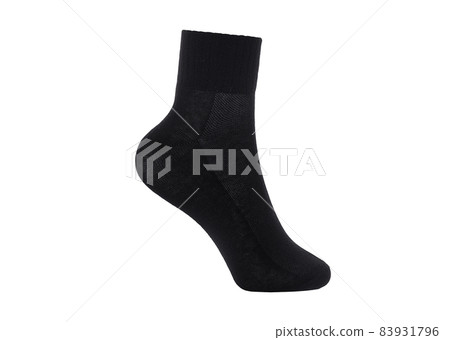 Black color socks isolated on white background. One pair of socks. Set of black socks for sports on foot as mock up for advertising, branding, design mockup, isolated, clipping path. 83931796
