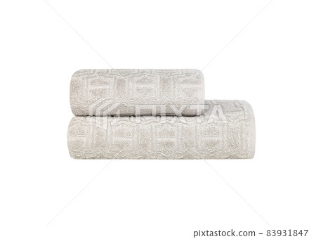 Beige duvet, blanket or bedspread. Wafer towels stack, grey towels in stack against the white backdrop. Pile, stock of thick organic cotton bath towels on white background. Beige plaid close up photo. Beige duvet, blanket or bedspread. Wafer towels stack, grey towels in stack against the white backdrop. Pile, stock of thick organic cotton bath towels on white background. Beige plaid close up photo. 83931847