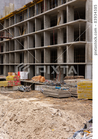 Construction of a multi-storey building in the city Construction of a multi-storey building in the city 83934385
