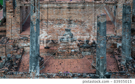 Ancient old buddha statue sculpture is damaged at the old temple in Ayuthaya. Ancient old buddha statue sculpture is damaged at the old temple in Ayuthaya. 83935015