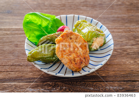 Stuffed chicken meatballs and peppers Stuffed chicken meatballs and peppers 83936463