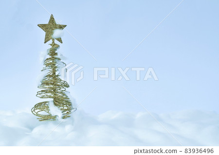 golden tree top star decoration in Christmas and new year festival with snow made by cotton diorama on white background 83936496