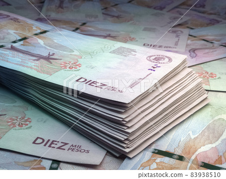 Colombian money. Colombian peso banknotes. 10 COP pesos bills. Colombian money. Colombian peso banknotes. 10 COP pesos bills. 83938510