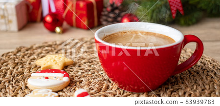 Merry Christmas with homemade cookies and coffee cup on wood table background. Xmas eve, party, holiday and happy New Year concept Merry Christmas with homemade cookies and coffee cup on wood table background. Xmas eve, party, holiday and happy New Year concept 83939783