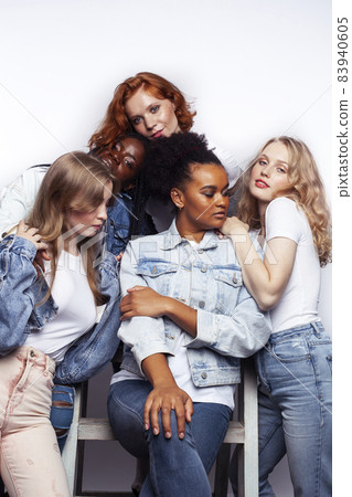 diverse multi nation girls group, teenage friends company cheerful having fun, happy smiling, cute posing isolated on white background, lifestyle people concept, african-american and caucasian diverse multi nation girls group, teenage friends company cheerful having fun, happy smiling, cute posing isolated on white background, lifestyle people concept, african-american and caucasian 83940605