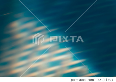 Blur glow background. Light flare. Underwater radiance reflection. Bokeh beam. Defocused blue orange rays flecks texture dark abstract overlay. 83941795