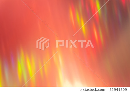 Defocused light overlay. Blur sparks. Disco party beam. Optic shine reflection. Bokeh neon red yellow green colorful rays on bright abstract background. Defocused light overlay. Blur sparks. Disco party beam. Optic shine reflection. Bokeh neon red yellow green colorful rays on bright abstract background. 83941809