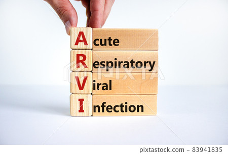 ARVI symbol. Abbreviation ARVI acute respiratory viral infection on wooden blocks. Beautiful white background. Doctor hand. Copy space. Medical and ARVI acure respiratory viral infection concept. ARVI symbol. Abbreviation ARVI acute respiratory viral infection on wooden blocks. Beautiful white background. Doctor hand. Copy space. Medical and ARVI acure respiratory viral infection concept. 83941835