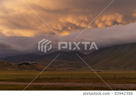 landscape near Castelluccio village in National Park Monte Sibillini, Umbria region, Italy landscape near Castelluccio village in National Park Monte Sibillini, Umbria region, Italy 83942388