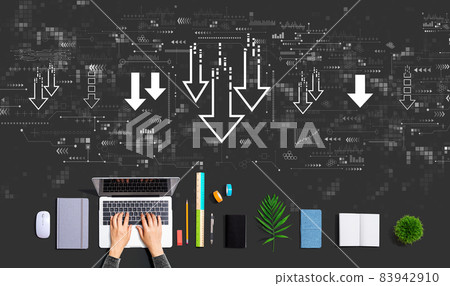 Descending arrows with person using a laptop 83942910