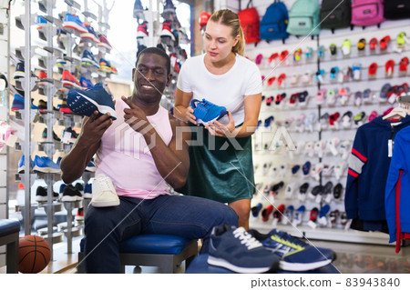 male customer looking sports shoes 83943840