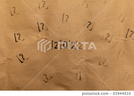 craft paper with 2022 and many stamped questions marks 83944810