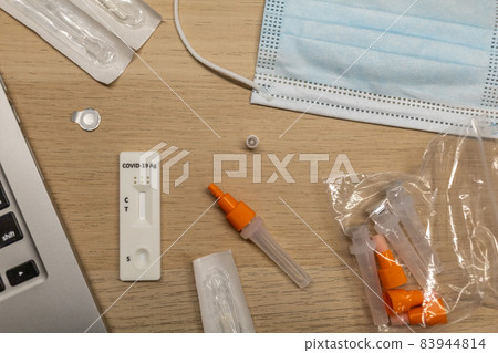 Rapid antigen covid self-test kit on the table 83944814
